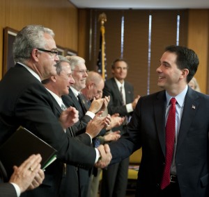 Governor-elect Walker shaking hands with UW Chancellors 
