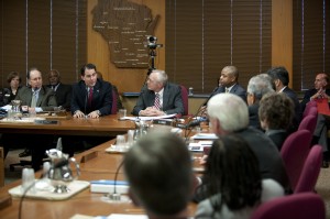 Governor-elect Scott Walker (second from left) addressing the Board of Regents