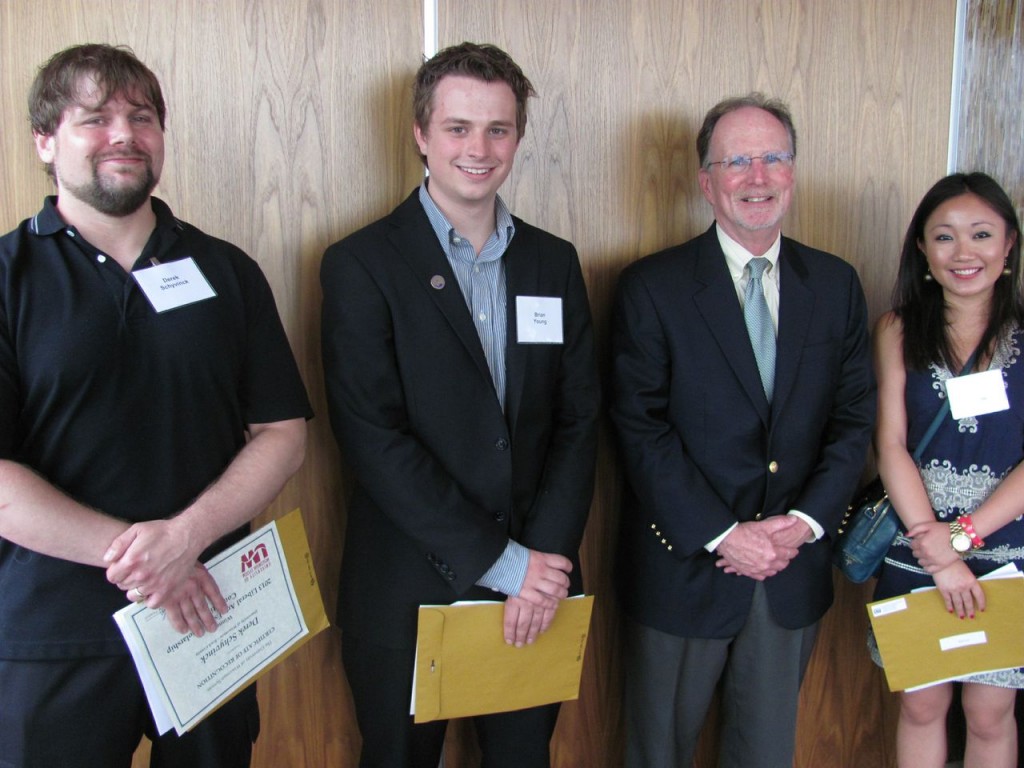 From left: Derek Schyvinck, Brian Young, President Reilly, and Ran (Laura) Luo