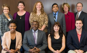  (back row, from left) Julie Bauer, Executive Director, Alliant Energy Foundation; Susan Brantly; Amanda Trewin; Kirthi Premadasa; Jo Ann Healy, Senior Community Affairs Program Manager, Alliant Energy Foundation; and Thomas Hanson, Senior Vice President and Chief Financial Officer, Alliant Energy Foundation. (front row, from left) Ada Umuber, accepting the award on behalf of her sister Joseline Nyinawabera; Lawrence Muffuh; Robin Kraidich; and Marcus Jackson. Photo Credit: James Gill