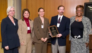 Regent Danae Davis, Professor Chris Bendel, and his colleagues in the Department of Mathematics, Statistics and Computer Science at UW-Stout