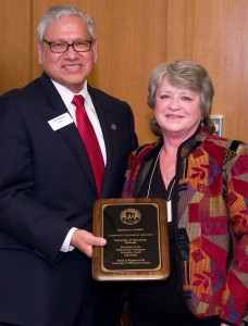 Regent José Vásquez presents Diversity Award to Roseann Mason