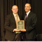 Matthew Roberts, UW-Platteville (right) accepts award from Regent Landes