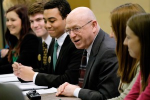 President Cross sits among student government leaders