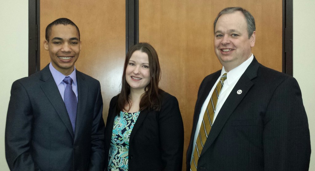 Rhodes Scholar Tayo Sanders, his mentor Dr. Jennifer Dahl, and UW-Eau Claire Chancellor James Schmidt