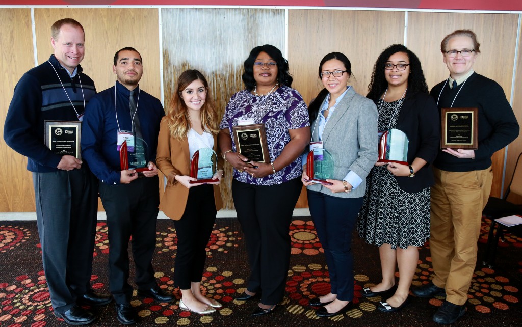 (from left) John Zumbrunnen, Eddie Espinoza, Vanessa Mariscal, Annie Kinwa-Muzinga, Jessica Rubio, Chinyere Nwabeke, and Richard Gustin. (Photo credit: Joe Koshollek)