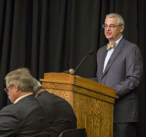 Photo of David Miller at podium