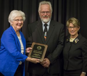 Dr. Mode (center) with Regent Farrow (left) and Regent Millner