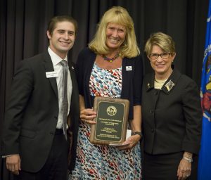 Dr. O’Beirne (center) with Regent Langnes (left) and Regent Millner