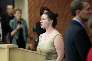 Katie Anderson, a UW-Madison music graduate student, sings the national anthem at the Regents meeting