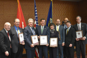 Photo of UW System presenting VETS certification