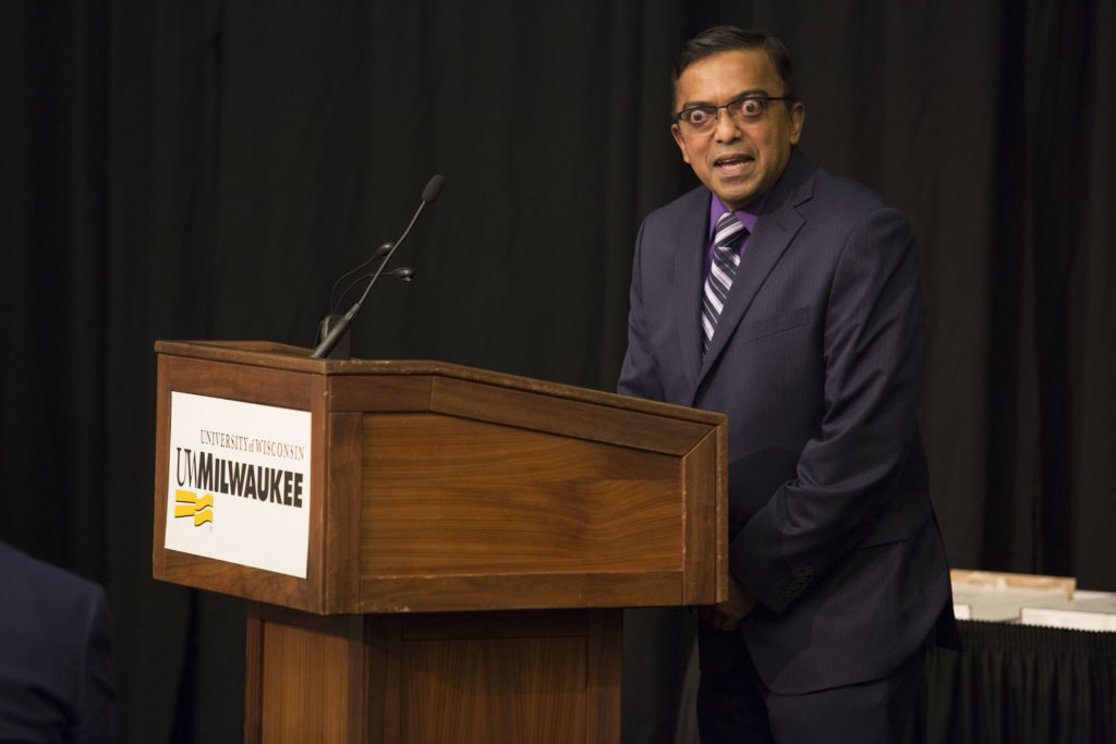 Photo of Kirthi Premadasa, Associate Professor, Mathematics Department, UW-Baraboo/Sauk County, UW Colleges, accepting the 2018 Regents Teaching Excellence Award