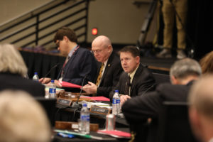 Photo of (from left) General Counsel Quinn Williams, UW System President Ray Cross, and Regent President John Robert Behling, taken at UW System Board of Regents meeting hosted by UW-La Crosse on December 6, 2018