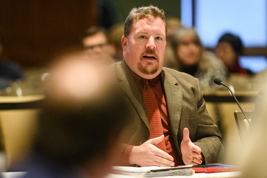 Christopher Poquet, UW-Green Bay’s Assistant Vice Chancellor for Policy and Compliance and chair of the Sexual Violence and Harassment Priorities Working Group, presents a report from the working group at the UW System Board of Regents meeting hosted at Union South at the University of Wisconsin-Madison on Feb. 7, 2019. (Photo by Bryce Richter /UW-Madison)
