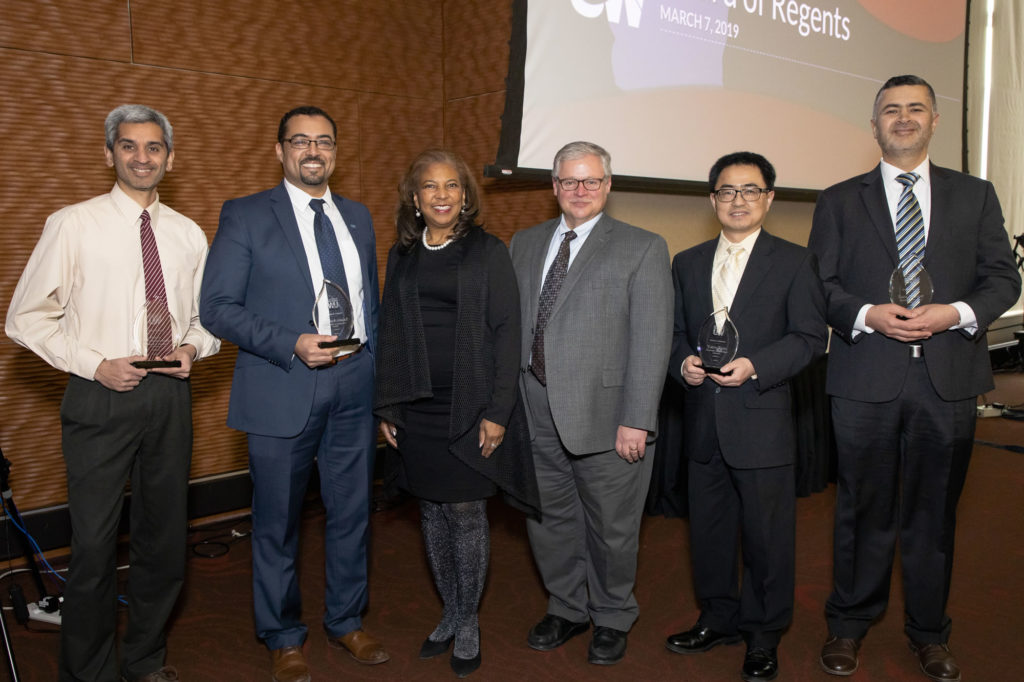 Photo of 2019 Regent Scholars (from left) Gokul Gopalakrishman, Saleh Alnaeli, Regent Eve Hall, Regent Mark Tyler, Yijun Tang, and Zaid Altahat. (Photo by Craig Wild/UW-Madison)