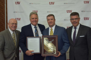 Photo of retiring UW-Stout Chancellor Robert Meyer, second from left, with President Ray Cross, Regent Jason Plante, and Regent President Andrew S. Petersen