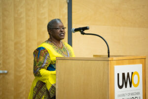 Photo of Brenda Cullin, UW-Milwaukee, accepting University Staff Excellence Award