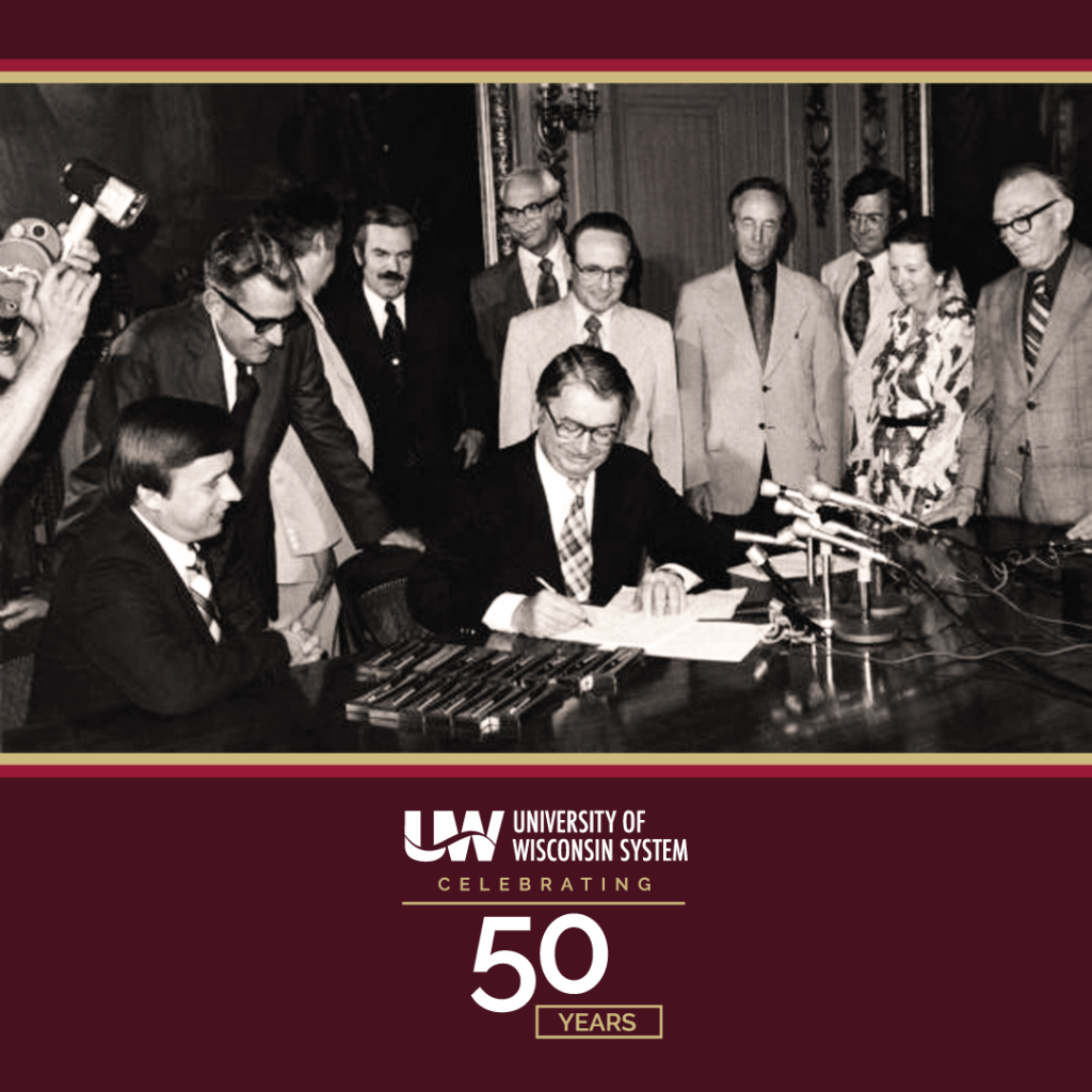 Photo of University of Wisconsin System signing in 1971; UW System celebrating 50 years in October 2021