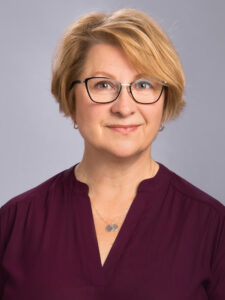 Photo of Robin Jens, Assistant Dean of Student Services, College of Nursing, and Interim Student Service Director, Zilber School of Public Health, UW-Milwaukee, recipient of Board of Regents 2022 Academic Staff Excellence Award