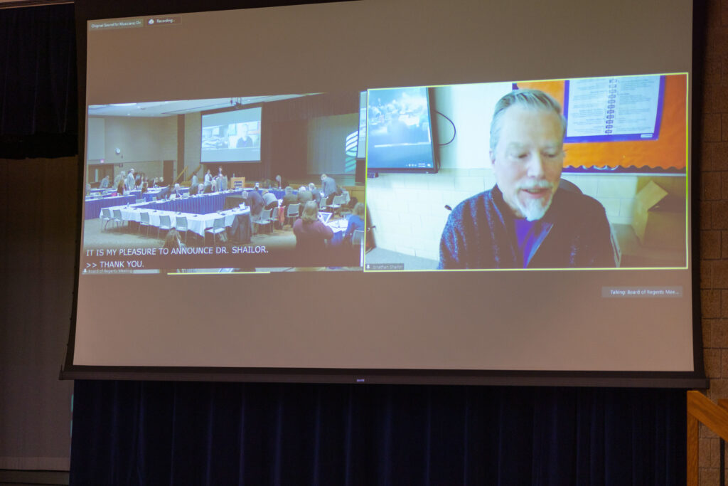 Photo of Dr. Shailor virtually accepting the Board of Regents 2023 Teaching Excellence Award.