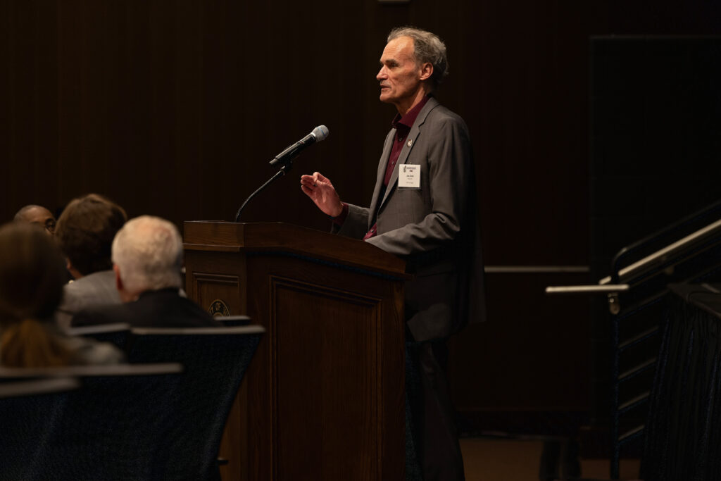 Photo of UW-La Crosse Chancellor Gow giving the host-campus presentation to the Board of Regents: “The Keys to UWL’s Success: Great Partnerships and Extraordinary People” (Photo by Jen Towner/UWL)