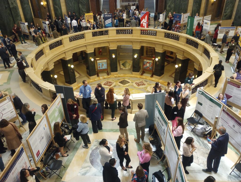 Photo of 20th annual Research in the Rotunda: More than 150 undergraduate students from across the University of Wisconsin System, along with their faculty advisers, showcased research projects at the 20th annual Research in the Rotunda event held in the Wisconsin State Capitol in Madison on March 6, 2024. (Photo credit: Universities of Wisconsin)