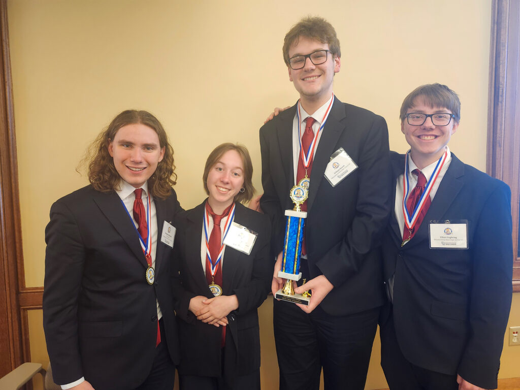 Photo of Wauwatosa West High School team 2, which won the 2026 Wisconsin Civics Games State Finals. Pictured from left: Benjamin Nowacek, Madelyn Ullsperger, William Moertl, and Elliott Engbring