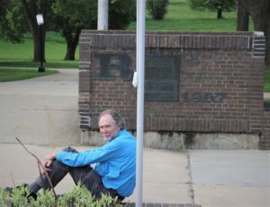 jim Robinson sitting outdoors