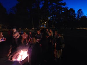 Photo of participants around the firepit