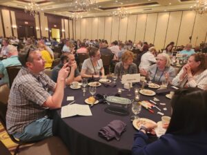 Photo of group from UW-Green Bay at table