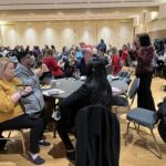 UW System Navigate and Advising Workshop March 9, 2023, at UW-Stevens Point, people seated at tables