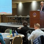 John Achter of UW System welcoming participants at the UW System Navigate and Advising Workshop March 2023 at UW-Stevens Point