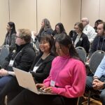 Participants seated in a breakout session at UW System Navigate and Advising Workshop March 2023 at UW-Stevens Point