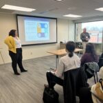 2 people presenting in a breakout session at UW System Navigate and Advising Workshop March 2023 at UW-Stevens Point