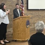 Megan Torkildson, left, of UW-Superior and Justin Bruchey of EAB at podium at breakout session during March 2023 workshop at UW-Stevens Point