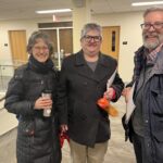 From left, standing next to each in their coats ready to leave, are Sara Roltgen, Ginger Bonow , and Gus Bonow at the UW System Navigate and Advising Workshop March 9, 2023, at UW-Stevens Point