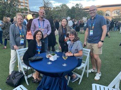 The Universities of Wisconsin contingent met up at an EAB reception kicking off the CONNECTED 2022 conference in Orlando, Florida. From left seated are Angie Kellogg and Andrea Smetana of UW System; standing from left are Sue Buth of the Universities of Wisconsin Administration, Brennan O'Lena and Pachoua Lor of UW-Milwaukee, and John Gaffney of UW-Stevens Point.  Click on the image to log in with your UW credentials and access conference materials.