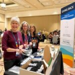Assembly of self-care kits at conference breakfast