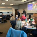 Carl Hampton of UW System shaking hands with Tim Renick of Georgia State at the University of Wisconsin System Fall Advising Workshop October 2018 at the Pyle Center in Madison Wisconsin