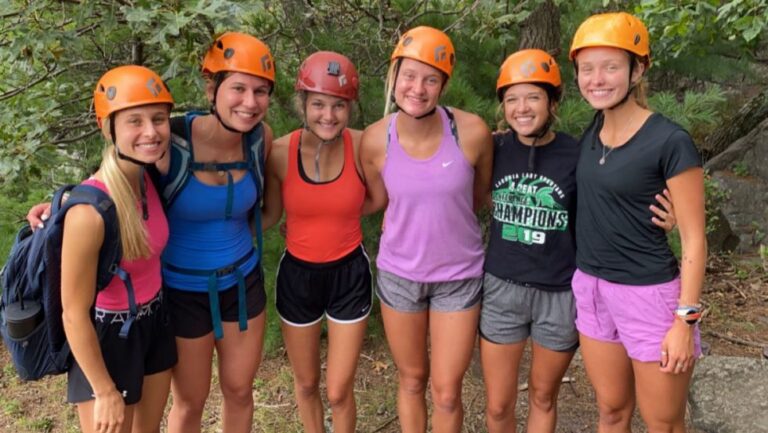 Photo of UW Oshkosh first-year student Emma Arent (left), of Kimberly, who joined a UW Oshkosh Titan Take Off adventure retreat to Devil’s Lake State Park to get to know other students better even before her first semester started in September.
