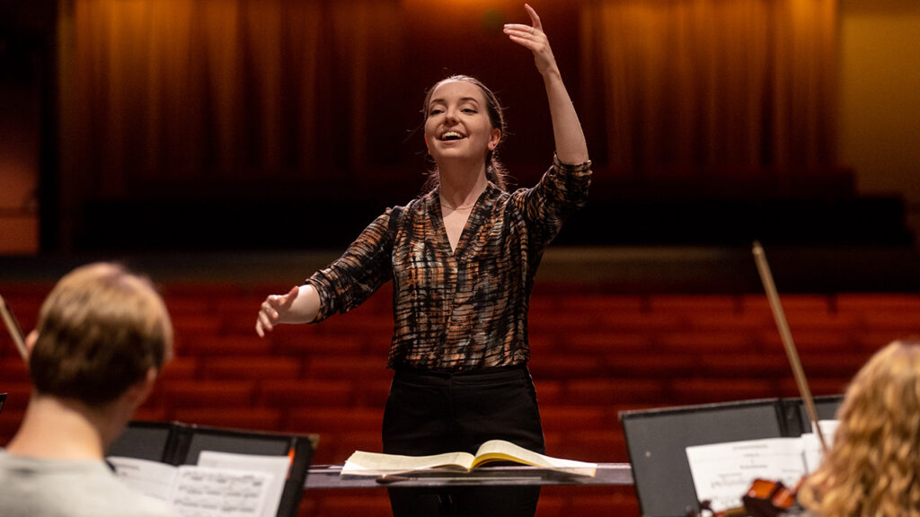 Photo of Megan Maddaleno, UW-Platteville director of orchestral activities. She is expanding the UW-Platteville Symphony Orchestra and enhancing its presence in the Platteville community.