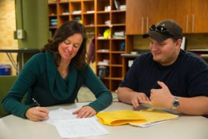 student with advisor