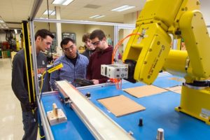 students working in robotic lab