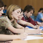 University students take notes in a lecture